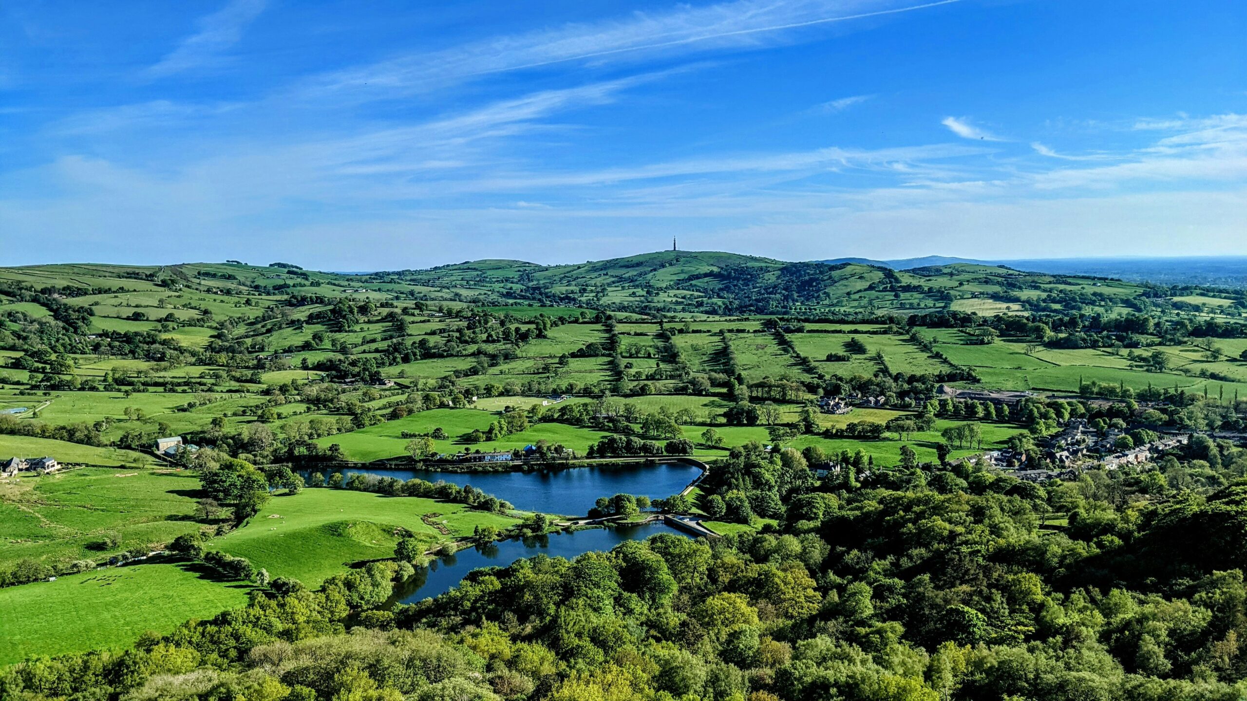 View of reservoirs and hills from Teggs Nose near Macclesfield on a summer's day